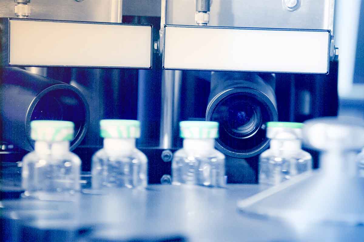 close up of a camera inspecting a vial or part